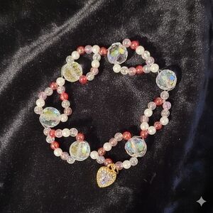 Dazzling Crystal and Pearl Bracelet with Gold Heart Charm